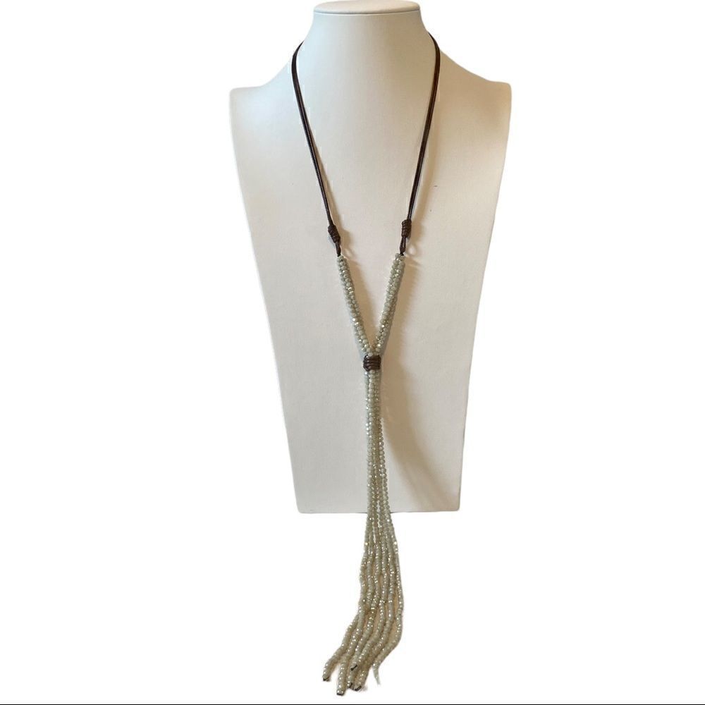 Multi-Strand Gray Beaded Faceted Lariat Style Necklace on Brown Cord.